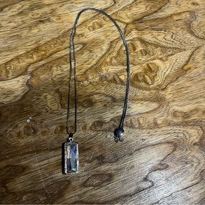 Luca + Danni Hudson iridescent silver necklace.